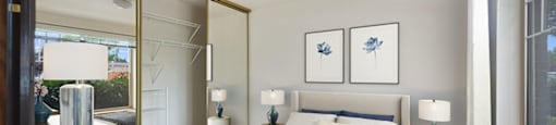 Bedroom with staged furniture at Boardwalk in Olympia WA