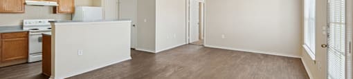 Dining room and kitchen at Ironwood Crossing Apartments and Townhomes in Fort Worth TX