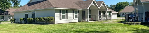 Exterior of leasing office at Dayton Park Apartments in Dayton TX