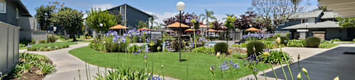 Exterior Landscaping Pool and Walkway at Westchester Park Apartments in Tustin CA