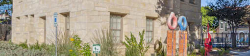 Exterior of leasing center at The Sorento Apartments in San Antonio TX