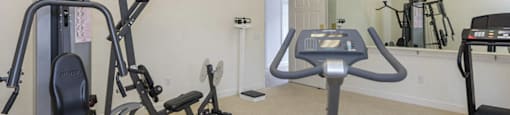 Fitness center at Whispering Oaks Apartments in Portsmouth VA