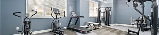 Fitness center machines at Grand Oaks Apartments in Chester VA