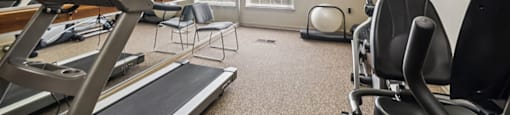 Fitness center at The Woods at Victoria Park Apartments in Woodbridge VA