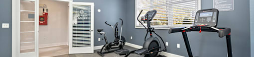Fitness center treadmill at Grand Oaks Apartments in Chester VA