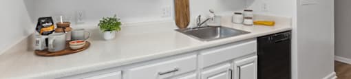 Kitchen with cabinets at Leesburg Apartments in Leesburg VA