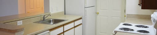 Kitchen area at Whispering Oaks Apartments in Portsmouth VA
