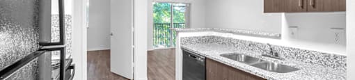 Kitchen with cabinets and fridge at Cedar Grove Apartments in Miami Gardens FL