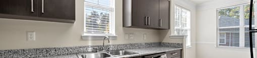 Kitchen and dining room at Grand Oaks Apartments in Chester VA