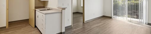 Kitchen and Living Room at Ballinger Court Senior Apartments in Edmonds, WA