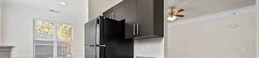 Kitchen and living room at Grand Oaks Apartments in Chester VA