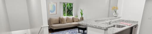 Kitchen with view of living room at Running Brook Apartments in Miami FL