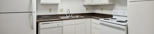 Kitchen Granite Countertops at Dayton Park Apartments in Dayton, TX