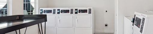 Laundry room at Tidwell Estates in Houston TX