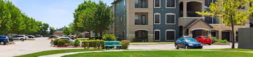 Lush lawn walkway at Parkway Senior Apartments in Pasadena TX