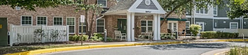 Leasing center exterior at The Woods at Victoria Park Apartments in Woodbridge VA