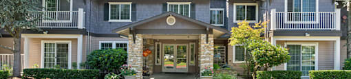 Leasing center exterior at Woodlands at Forbes Lake Apartments in Kirkland WA