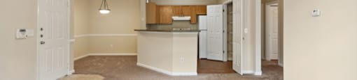 Carpeted living room at Longwood Vista Apartment Homes in Atlanta GA