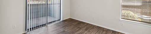 Living Room and Patio at Tivoli apartments in Dallas TX