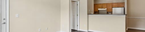 Living room with view of kitchen at Longwood Vista Apartment Homes in Atlanta GA
