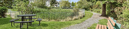 Picnic table and pathway at Woodrose Senior Affordable Apartments in Bellingham WA