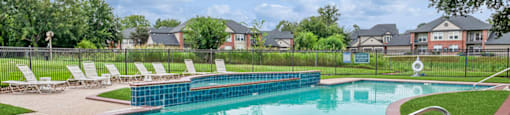 Large outdoor pool at Hollow Creek Apartments in Conroe TX