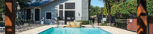 North Dallas Apartments for Rent - Tivoli - Large Pool Area with Lounge Chairs