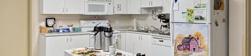 Kitchen with white cabinets at Alderwood Court in Lynnwood WA