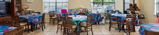 Social lounge tables at Parkway Senior Apartments in Pasadena TX