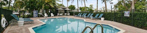 Outdoor Swimming pool at Brenton at Abbey Park Apartments in West Palm Beach FL