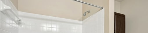 Bathroom with shower at Fountains at Tidwell and The Enclave in Houston TX