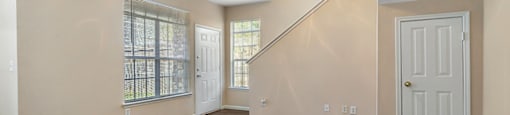 Living room with lighting at Fountains at Tidwell and The Enclave in Houston TX