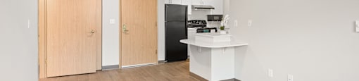 Upgraded Kitchen and living room at Meridian Court Apartments in Federal Way WA