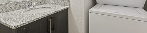 Washer and dryer at Brenton at Abbey Park Apartments in West Palm Beach FL