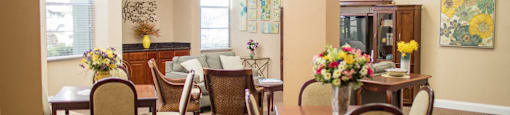 Episcopal Catholic Apartments in Winter Park, FL rec room with seating