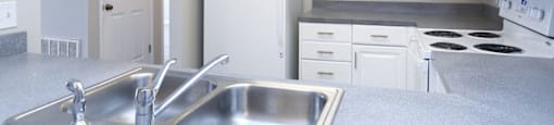 Kitchen with appliances at Karen Lake