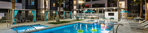 Pool with view to firepit at ARISTA APARTMENT HOMES, Las Vegas, NV