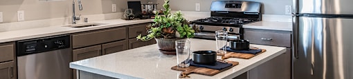 Kitchen with island at ARISTA APARTMENT HOMES, Las Vegas, NV, 89183