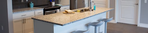 Open concept kitchen at Heritage Place Apartments in Grand Rapids, MI