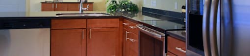 kitchen refrigerator rang dishwasher microwave