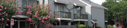 Gated apartment community conveniently located in the Bayou area of Houston with lush landscaping, scenic views, and reserved and covered parking.