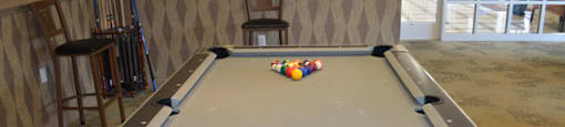 Billiards table in game room