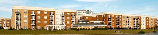 Apartment buildings overlooking pond