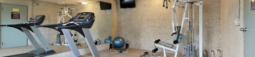 Apartments for Rent in Sherman Oaks - Brody Terrace - Fitness Center with a Bench Press Machine and a Treadmill