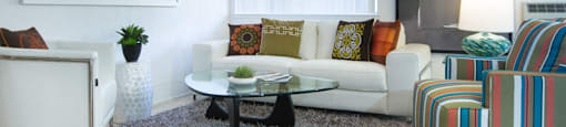 Sienna Apts living room area with couches and sitting chairs