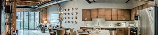 a kitchen and dining area in a loft