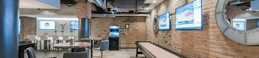 Chicago luxury apartment game room amenity with shuffle board