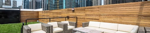 Chicago luxury apartment roof deck with seating and outdoor movie screen