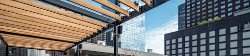 Chicago luxury apartment roof deck with seating and dining area