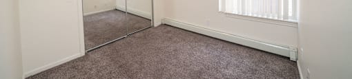 Spacious bedrooms in East Lansing Apartments near Michigan State University | River Park